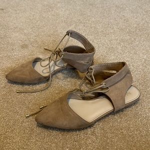 Nude lace up pointed toe flats